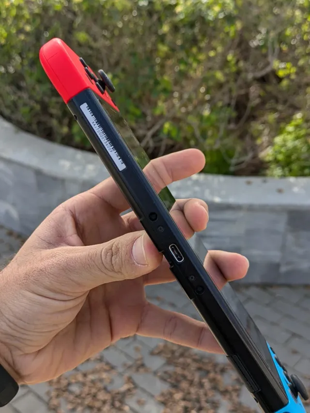 Nintendo Switch Completa Azul y Rojo con funda