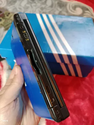 Nintendo 3DS XL blu con caricatore e pennino