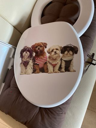 Tapa de inodoro con perros