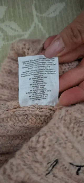 Cappello Xmail con orecchie e pompon