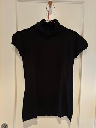 Jersey cuello alto sin mangas negro