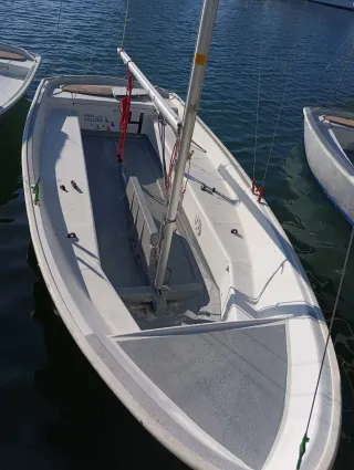 Raquero escuela vela