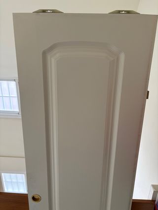 Puerta corredera lacada blanca