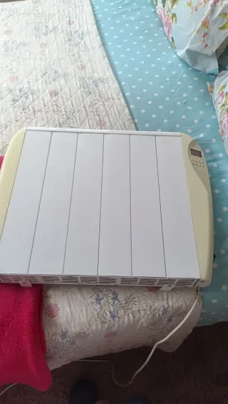 Radiador con soportes para colgar