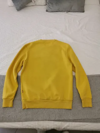 Sudadera amarilla con bicicleta