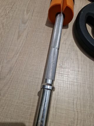 Barra de pesas con discos y cierres