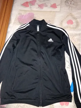 Giacca Adidas nera con strisce bianche