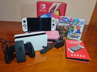 Nintendo Switch OLED + Giochi e Accessori
