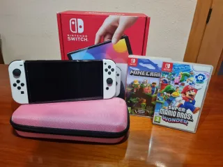 Nintendo Switch OLED + Giochi e Accessori