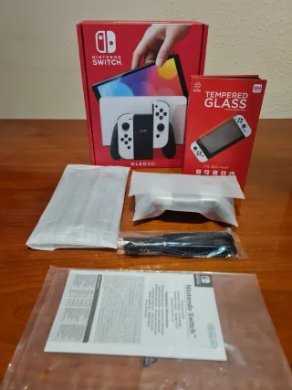 Nintendo Switch OLED + Giochi e Accessori