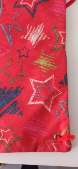 Bolsa mochila con cordones y estrellas
