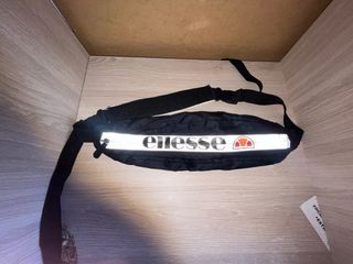Riñonera Ellesse reflectante negra