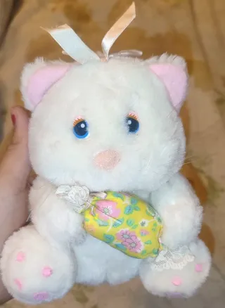 Peluche gattino bianco con caramella