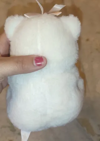 Peluche gattino bianco con caramella