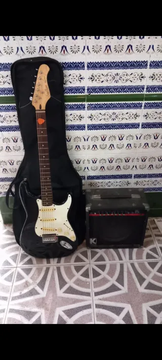 Guitarra Eléctrica Negra + Amplificador