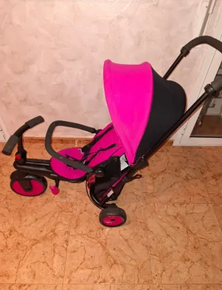 Triciclo infantil rosa y negro