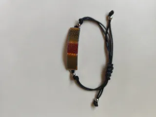 Pulsera elegante dorada y negra