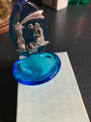 sacra famiglia in argento su acquasantiera