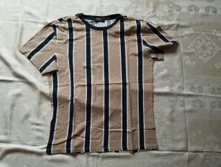 Camiseta de rayas beige y negro