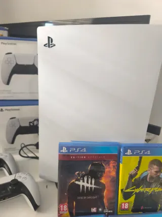 Consola PS5 +3mandos+4 juegos+30 digitales +1tb.