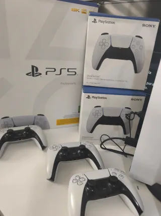 Consola PS5 +3mandos+4 juegos+30 digitales +1tb.