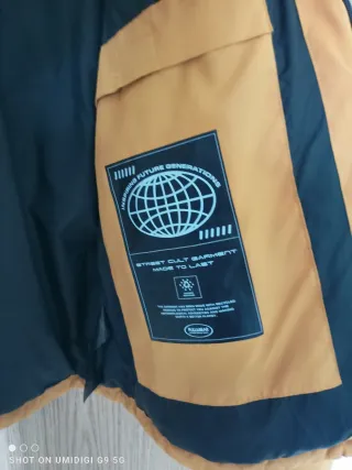 Cazadora Mostaza con Capucha