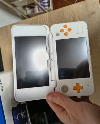 Nintendo 2DS XL Arancione/Bianco