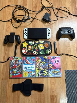 Nintendo Switch OLED + 4 giochi + Accessori
