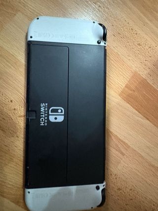 Nintendo Switch OLED + 4 giochi + Accessori