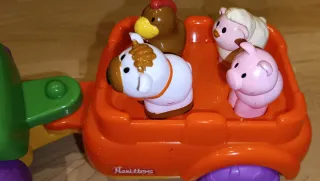 Tractor musical con remolque y animales