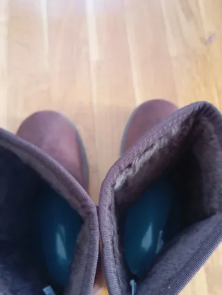 Botas marrones de pelo nuevas