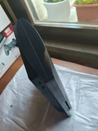 PlayStation 3 Slim con giochi