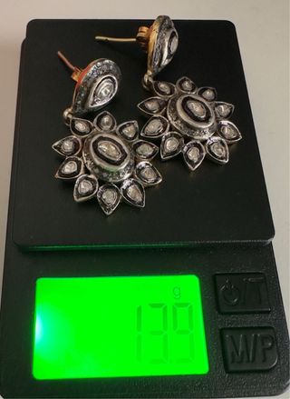 Pendientes antiguos y diamantes