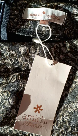 Falda midi tubo Amichi negra y dorada