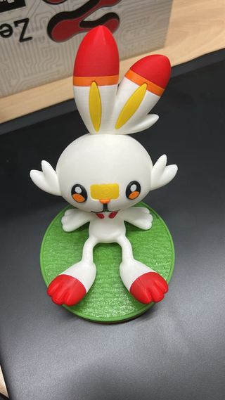 Soporte teléfono/carta Meltan Pokémon