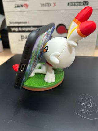 Soporte teléfono/carta Meltan Pokémon