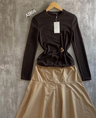 Vestido doble tejido con broche