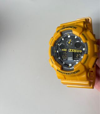 Reloj G-Shock GA-100 Analógico-Digital Amarillo