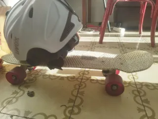 Skate con casco Uvex