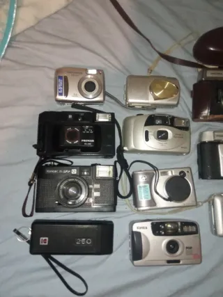 Lote di 11 Fotocamere Olympus, Nikon, HP