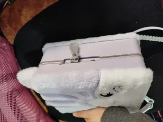 Mochila y muñeca  Peluche  Na,Na,Na sorprise