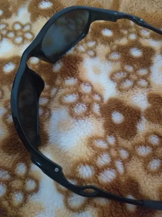 Gafas de sol Oakley negras y grises