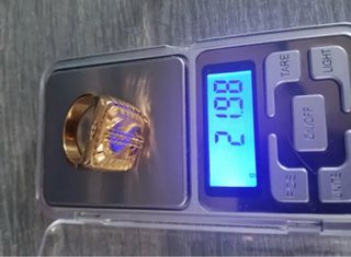 Anillo Sello Dólar Oro 18k