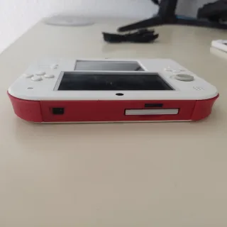 Nintendo 2DS + Super Smash Bros + Caricatore