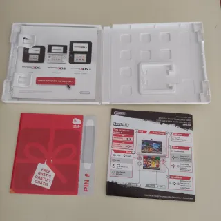 Nintendo 2DS + Super Smash Bros + Caricatore