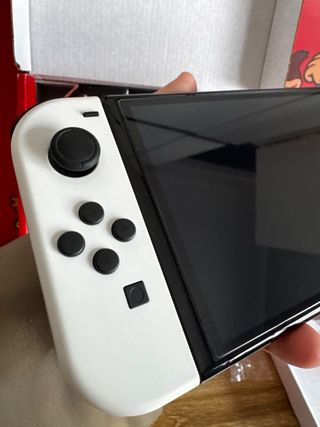 Nintendo Switch OLED CÓMO NUEVA AÚN CON PLÁSTICOS