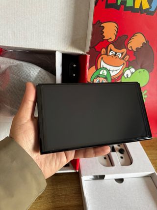 Nintendo Switch OLED CÓMO NUEVA aún con plásticos.