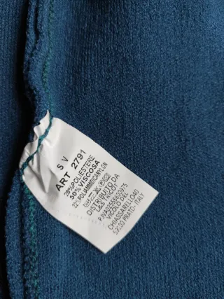 Chaleco azul con botones plateados