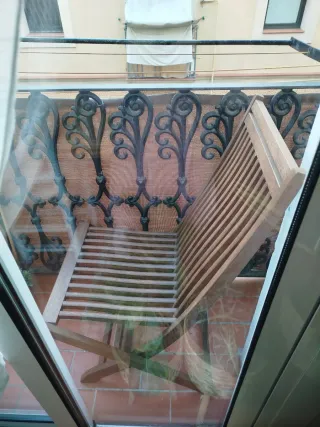 Silla plegable de madera para terraza