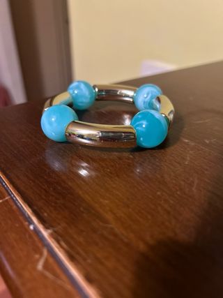 Bracciale elastico oro e turchese